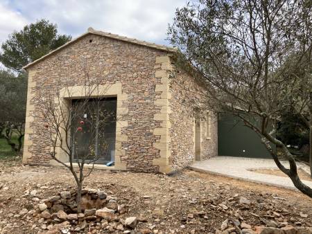Construction d'une extension en pierre de site dans le Gard à Nimes